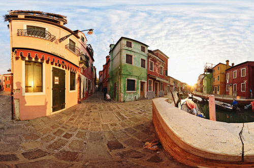 Virtual tour travel photography destination, sunrise by the canal in Burano, colourful houses in every direction.