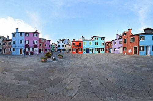 A square of colourful houses, a perfect subject for 360 degree travel photography on the island of Burano, Venice.