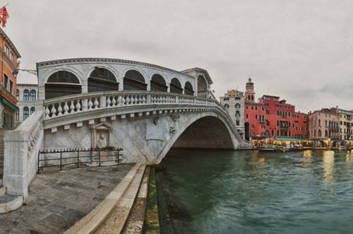Historic Rialto Bridge at first light in full 360 degree view photography
